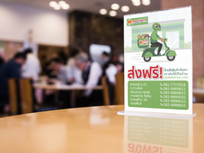 Mock up Menu on Table Bar Restaurant Cafe with Blur People Shop interior